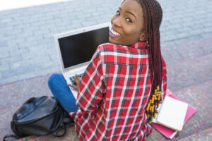 adorable-student-with-computer